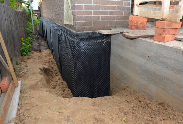 SJ Waterproofing Pros technician performing targeted Exterior Waterproofing assessment in Allendale, SC
